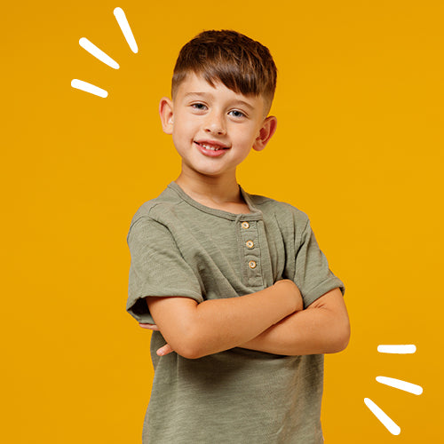 smiling boy in green tee