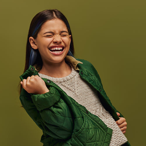 girl in green coat